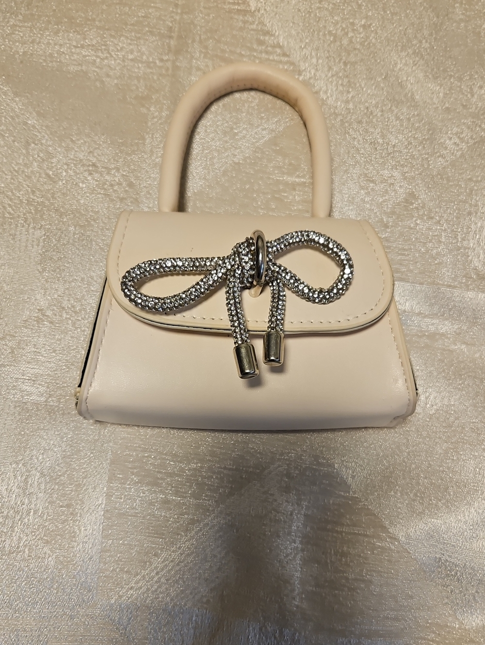 Mini Cream Top-Handle Bag with Rhinestone Bow Accent